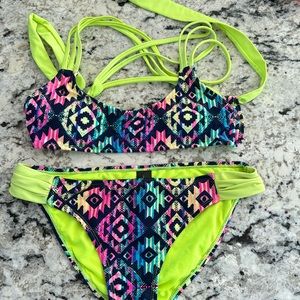 Medium and small bikini; no underwire; vibrant colors; cross cross back